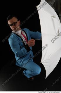 10 2018 01 MIKAEL KNEELING POSE WITH UMBRELLA